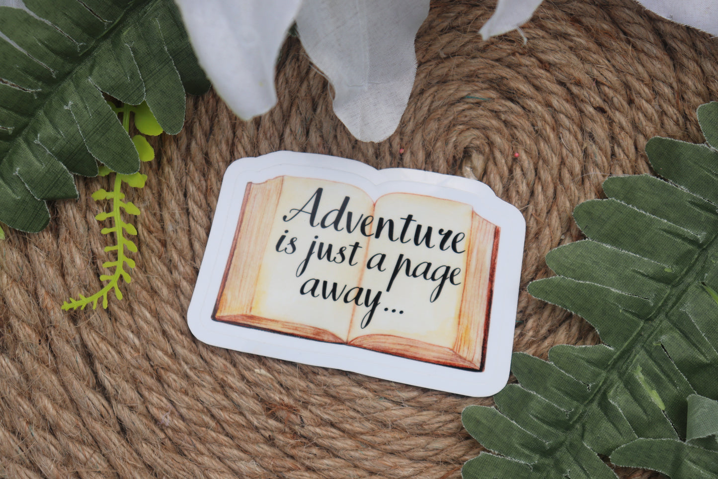 Adventure is just a page away sticker