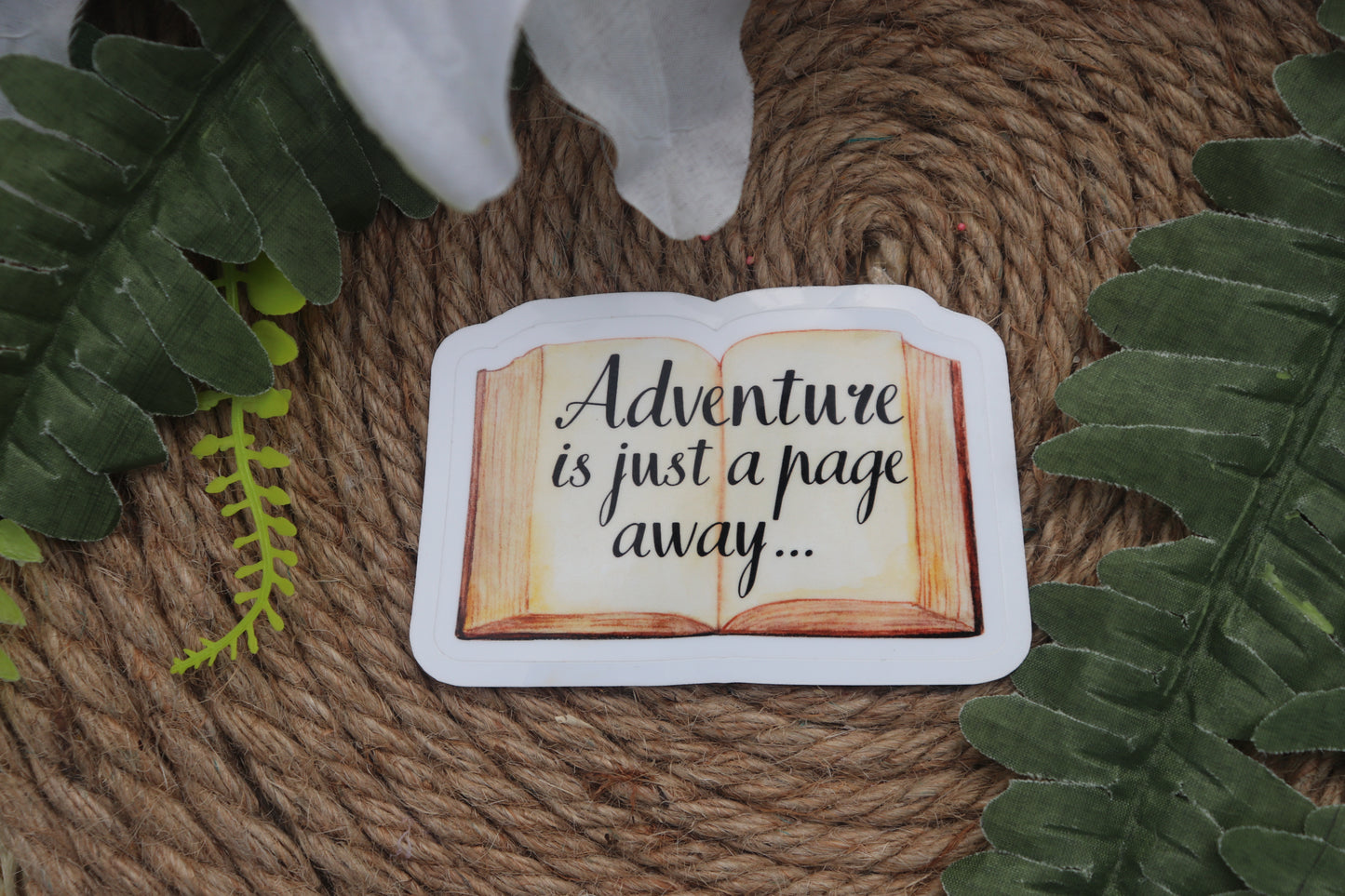 Adventure is just a page away sticker